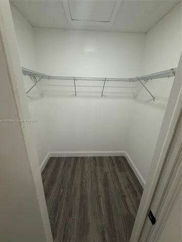 a view of a room with racks on the wall