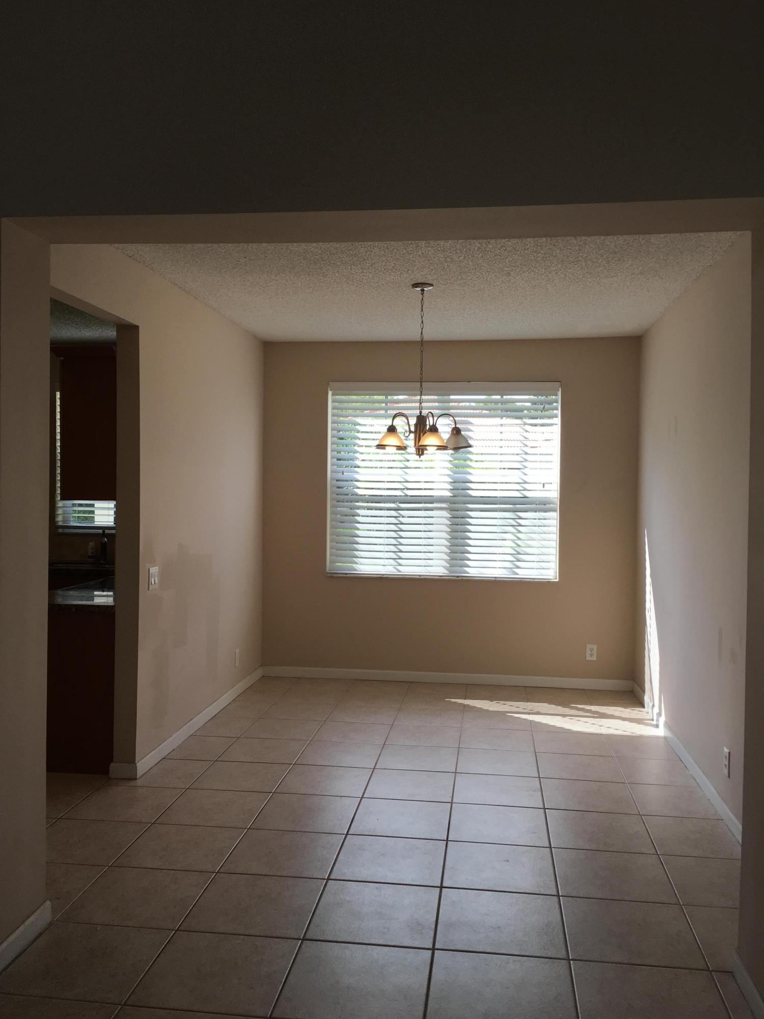 4383 Laurel Ridge Circle Weston, FL 33331 - Photo 12 of 36 a view of livingroom with kitchen