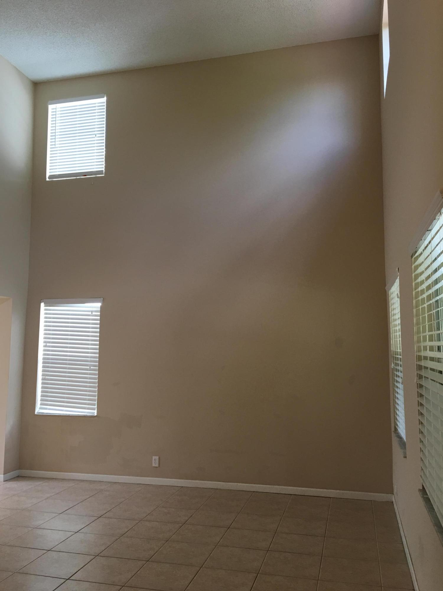4383 Laurel Ridge Circle Weston, FL 33331 - Photo 14 of 36 a view of an empty room with a window