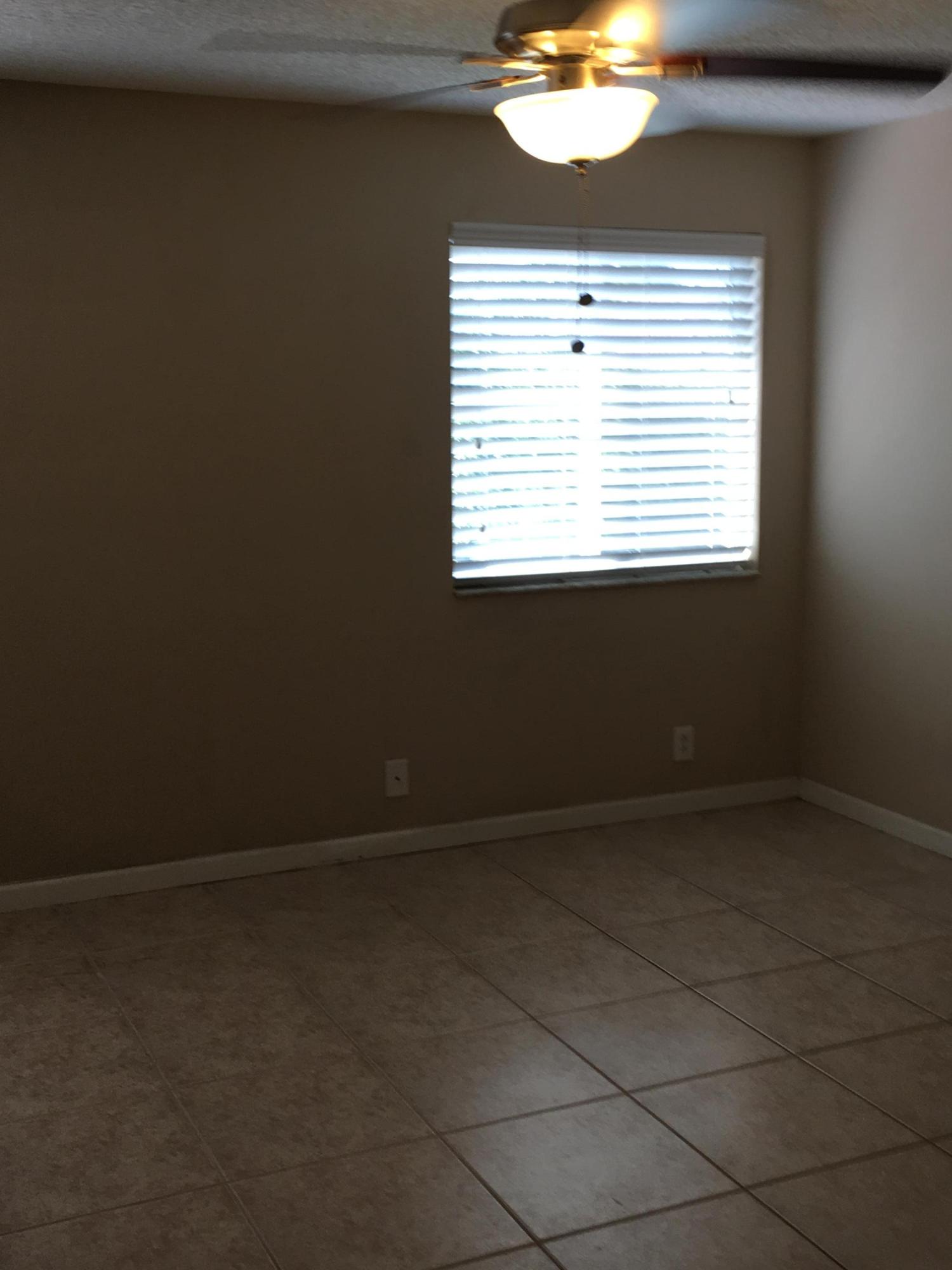 4383 Laurel Ridge Circle Weston, FL 33331 - Photo 17 of 36 an empty room with a window