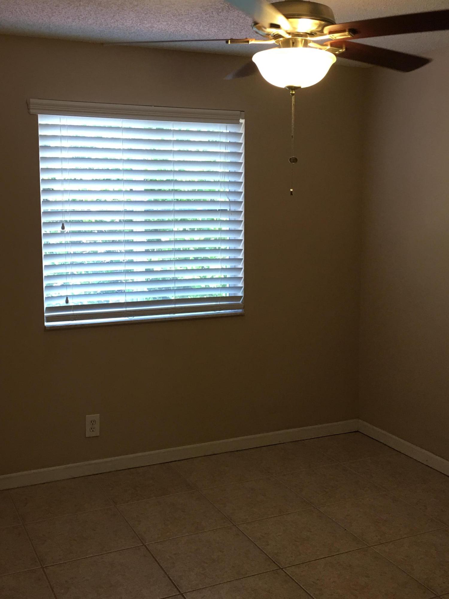 4383 Laurel Ridge Circle Weston, FL 33331 - Photo 19 of 36 an empty room with a window