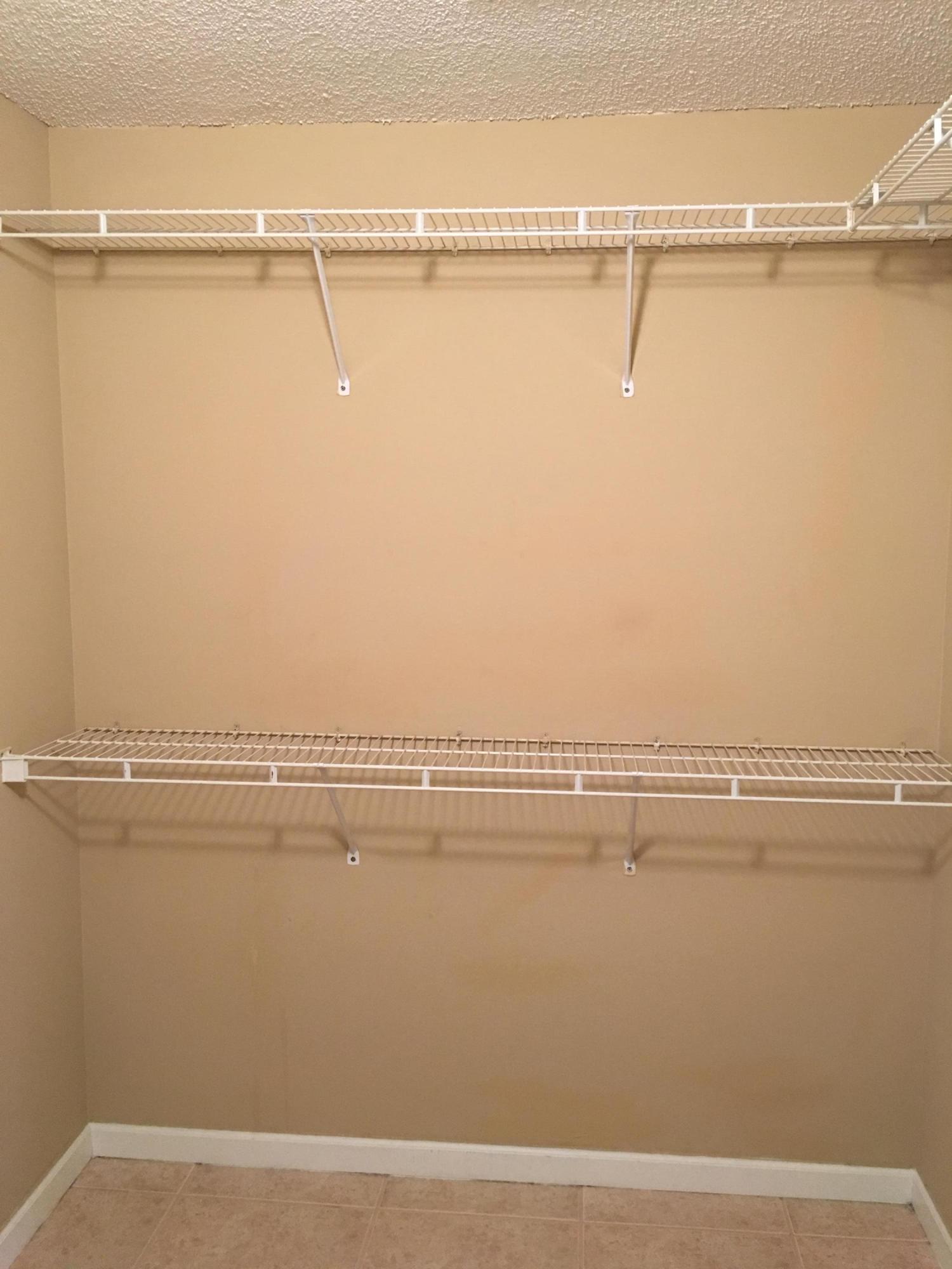 4383 Laurel Ridge Circle Weston, FL 33331 - Photo 27 of 36 a view of a room with racks on the wall