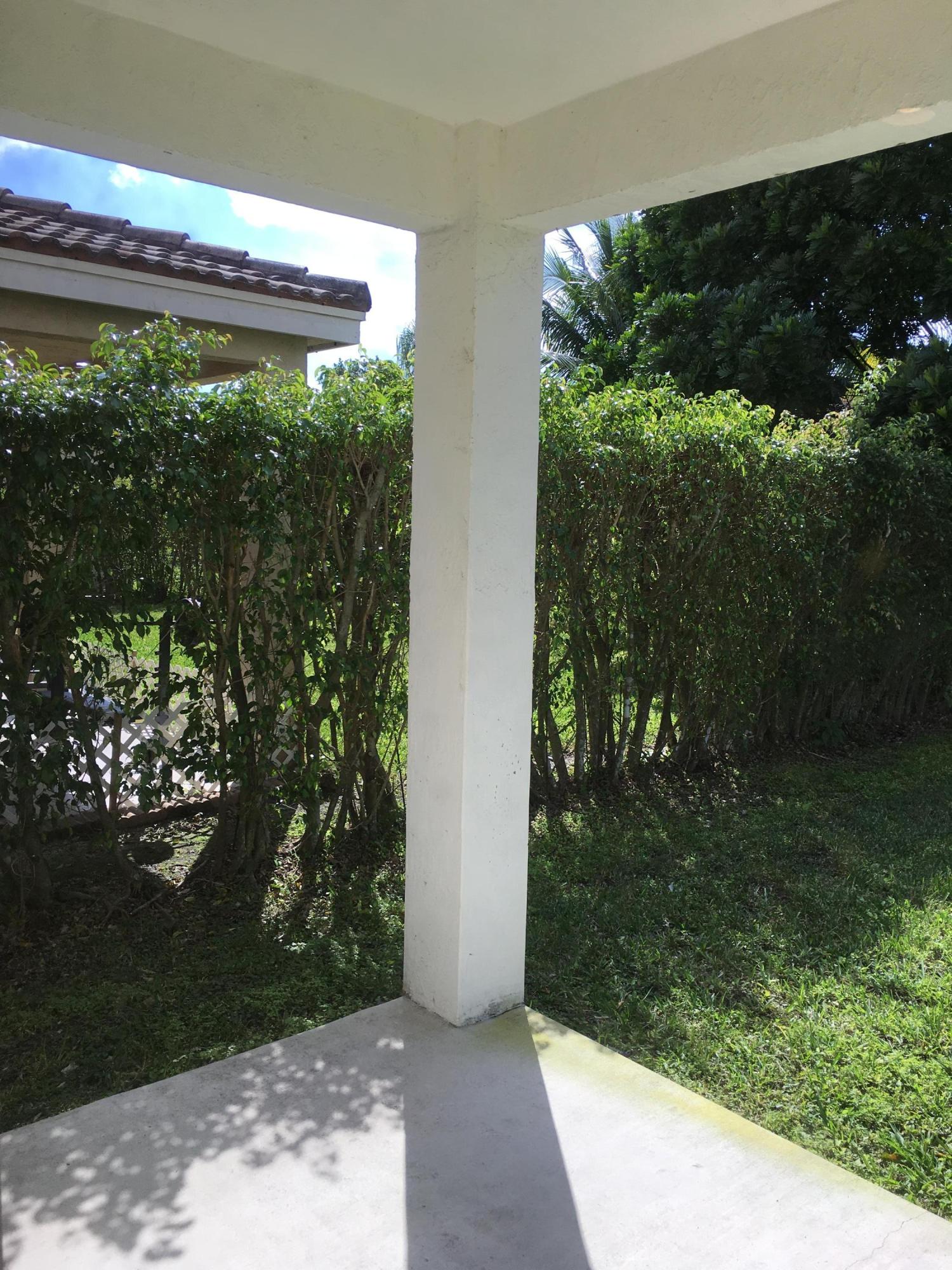 4383 Laurel Ridge Circle Weston, FL 33331 - Photo 29 of 36 a view of a backyard