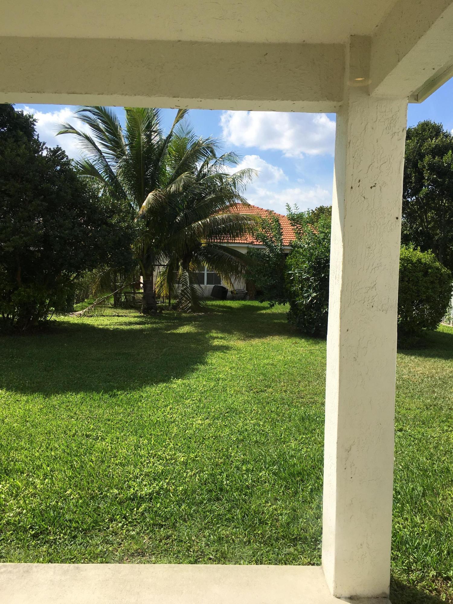 4383 Laurel Ridge Circle Weston, FL 33331 - Photo 31 of 36 a view of a park with large trees