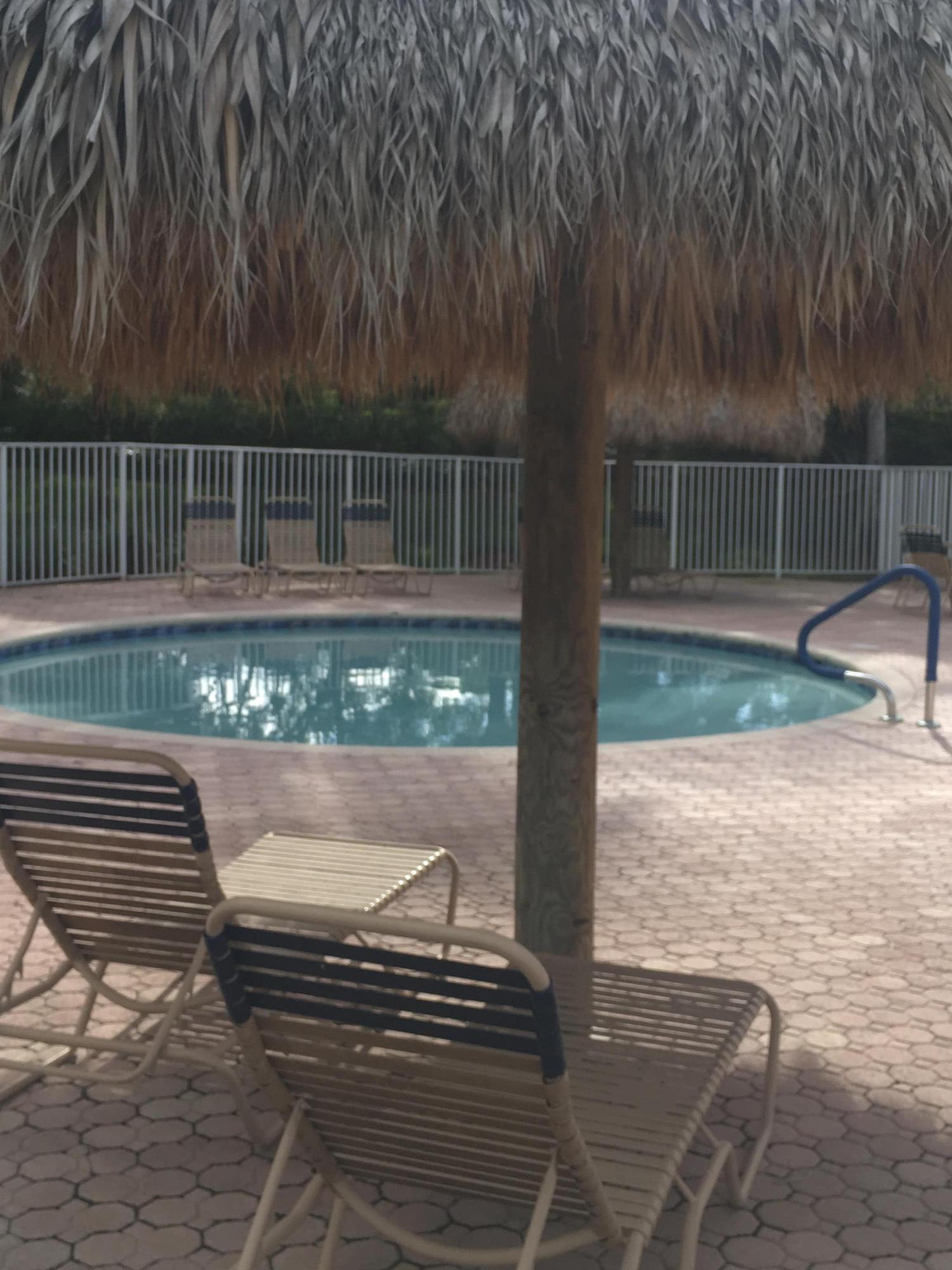 4383 Laurel Ridge Circle Weston, FL 33331 - Photo 35 of 36 a view of a yard with wooden fence