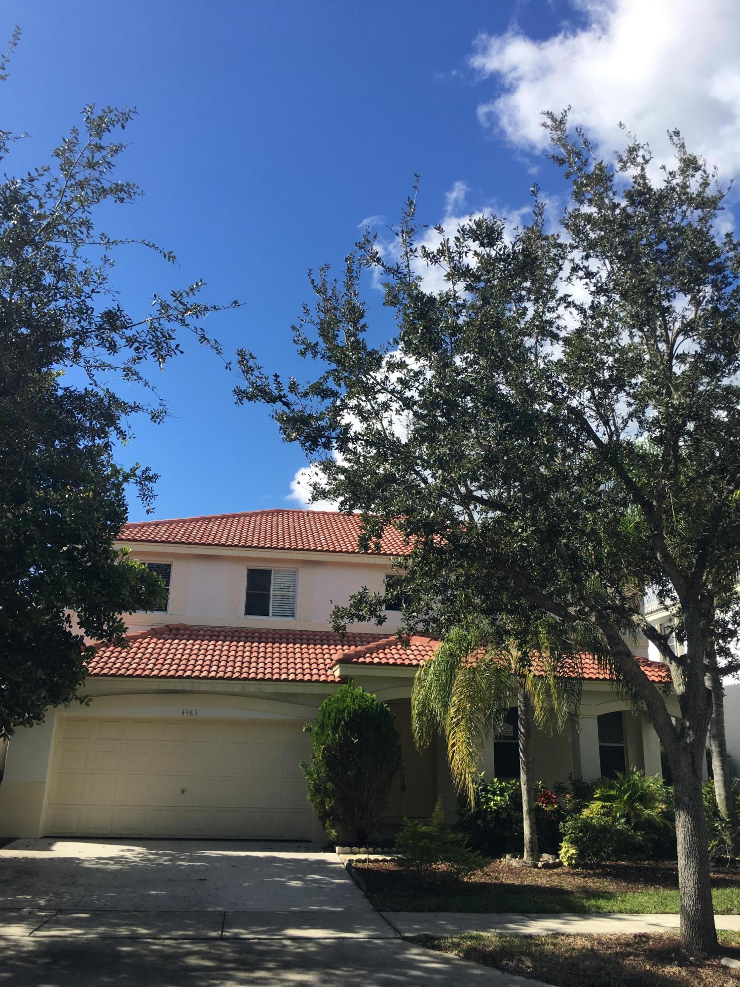 4383 Laurel Ridge Circle Weston, FL 33331 - Photo 5 of 36 a view of a house with a yard
