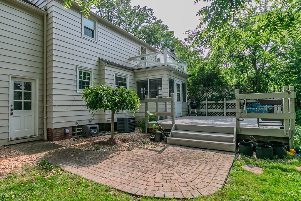 5195 Mayview Road Cleveland, OH 44124 - Photo 6 of 49 Rear view of house featuring a deck and a patio area