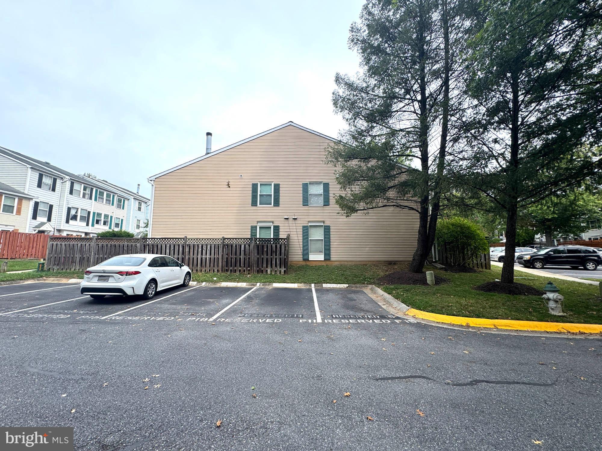 11200 Legato Way Silver Spring, MD 20901 - Photo 14 of 15 a view of street with parked cars