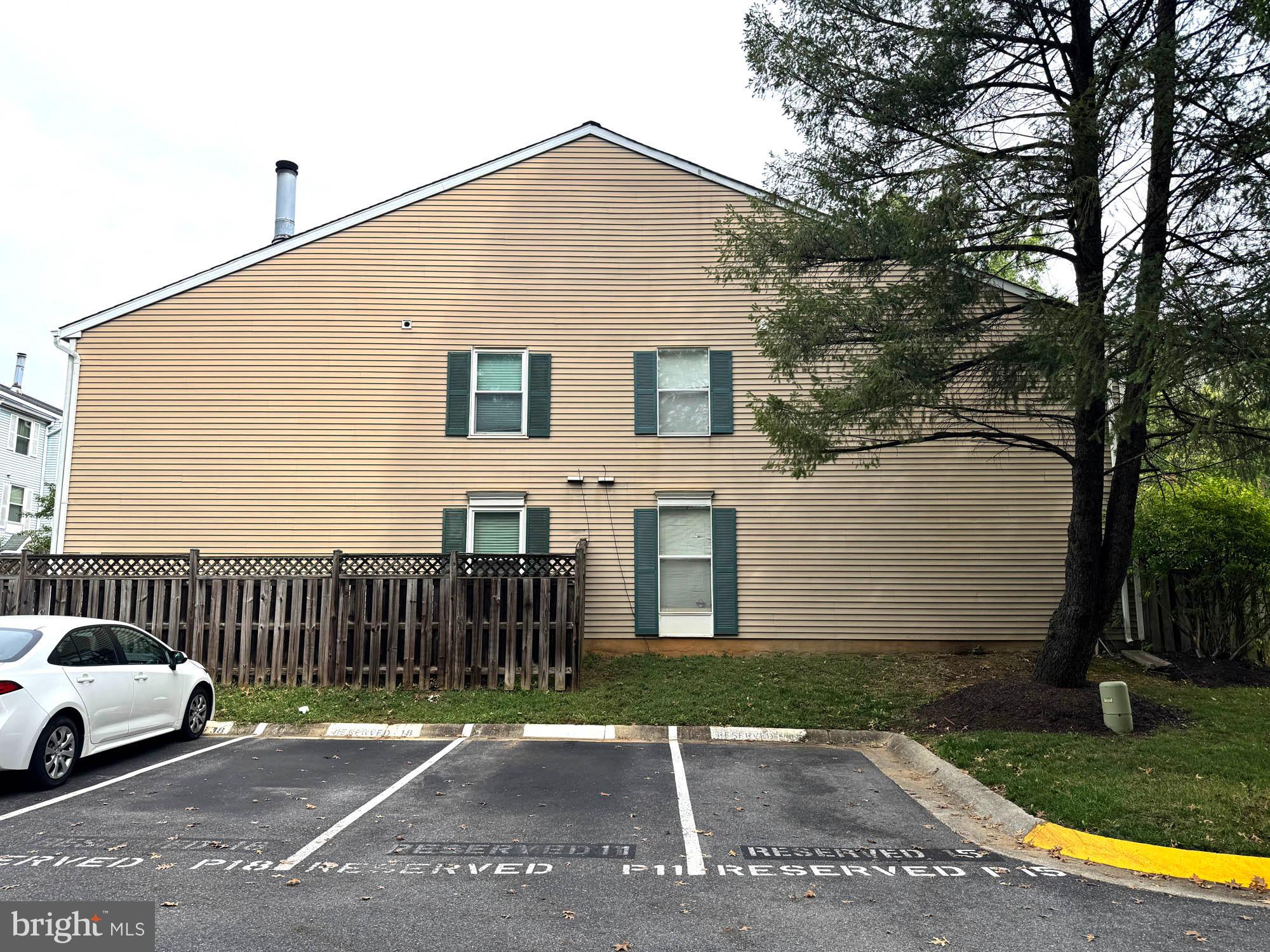 11200 Legato Way Silver Spring, MD 20901 - Photo 2 of 15 a view of a house with a yard