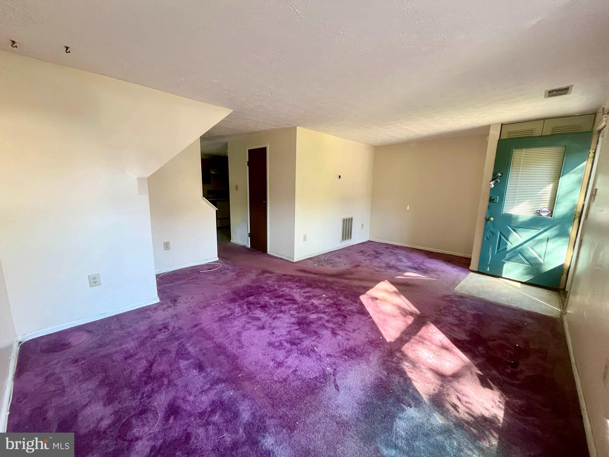 11200 Legato Way Silver Spring, MD 20901 - Photo 3 of 15 a bedroom with a bed and a mirror