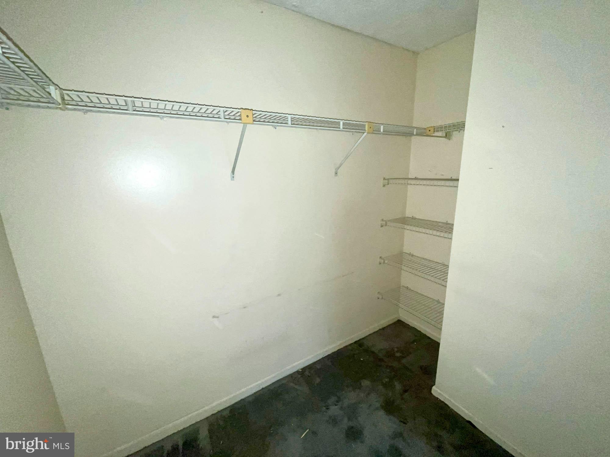 11200 Legato Way Silver Spring, MD 20901 - Photo 9 of 15 a view of a room with racks on the wall