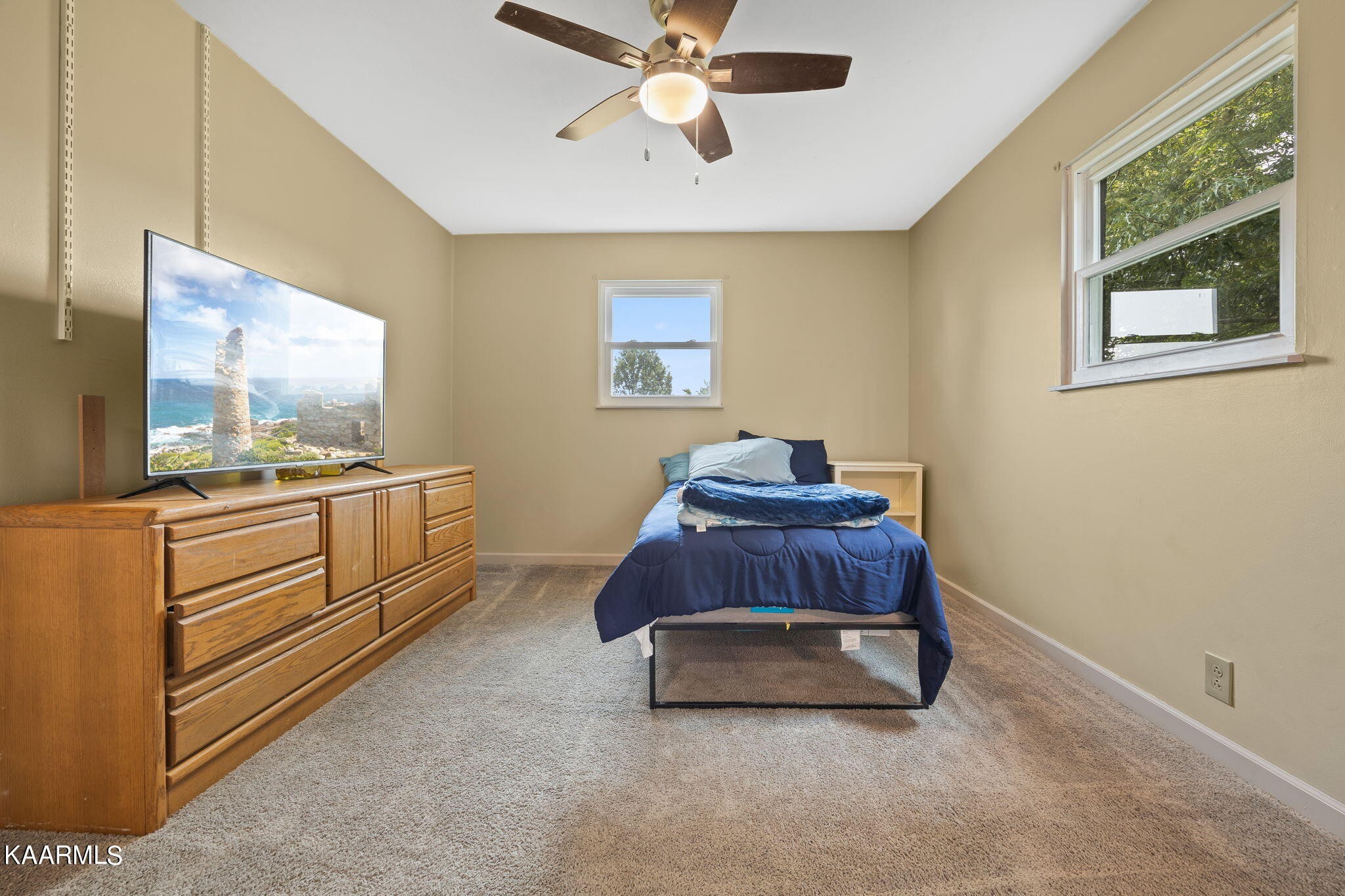 3325 Wade Road West, Unit W Loudon, TN 37774 - Photo 15 of 36 a living room with furniture and a flat screen tv