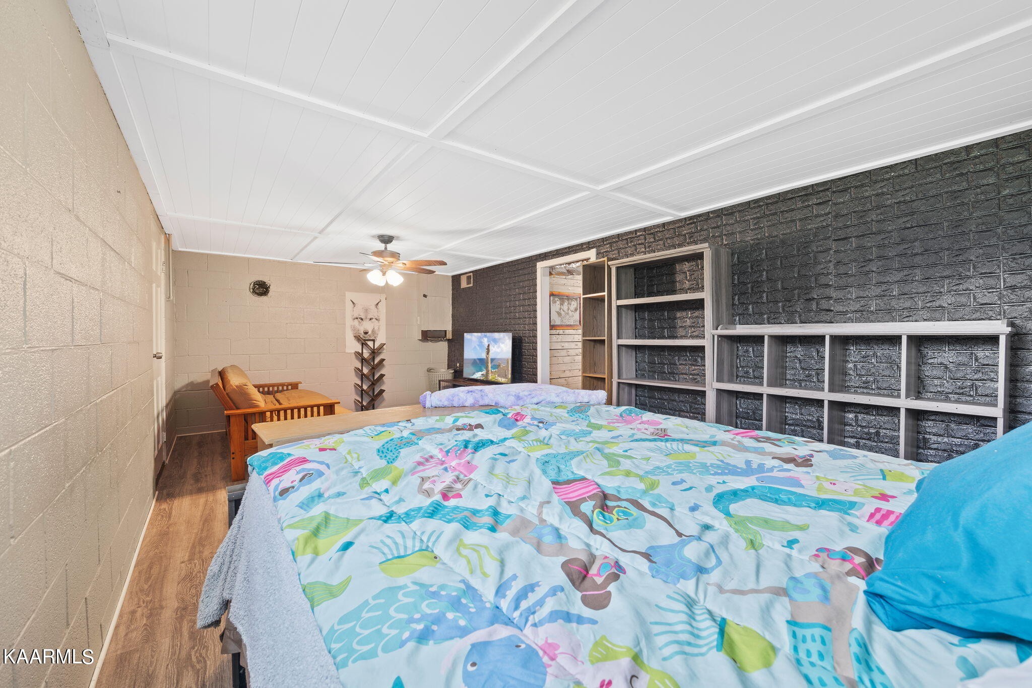 3325 Wade Road West, Unit W Loudon, TN 37774 - Photo 21 of 36 a bedroom with a bed closet and a window
