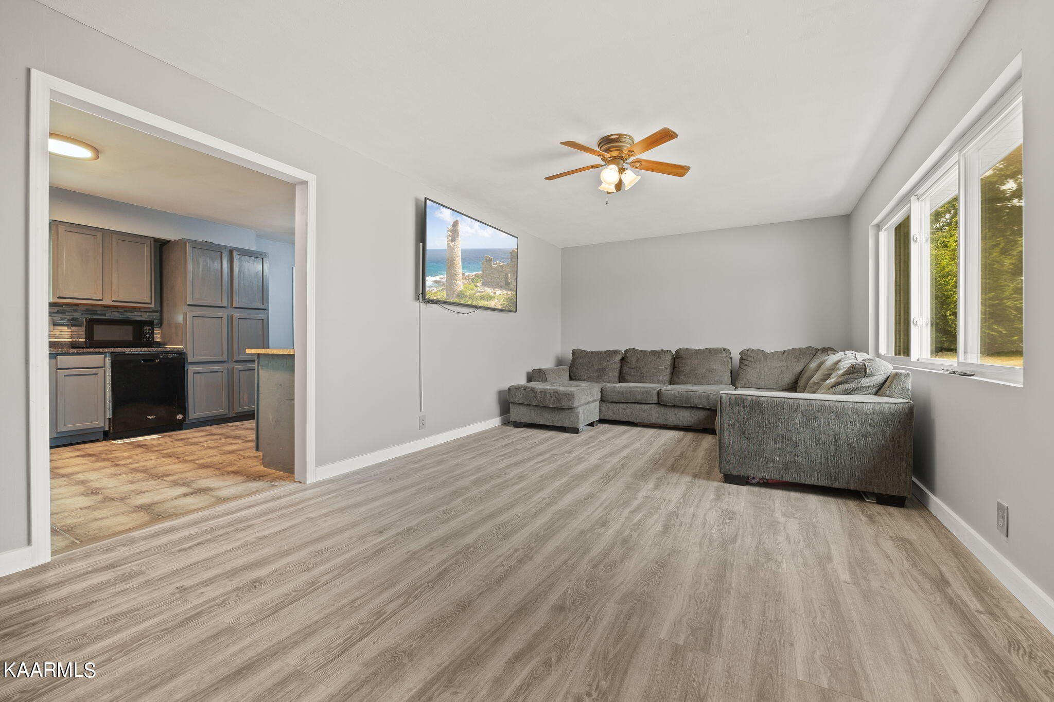 3325 Wade Road West, Unit W Loudon, TN 37774 - Photo 4 of 36 a living room with furniture and a wooden floor