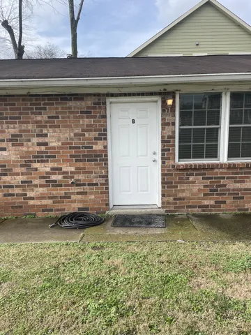 a view of a backyard of a house
