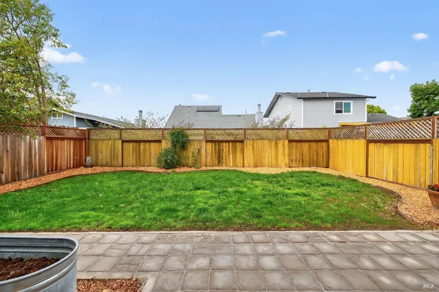 a view of a backyard with a garden