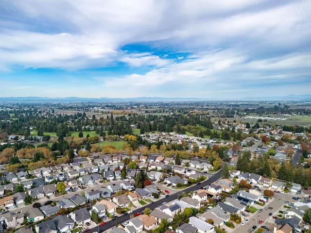 an aerial view of a city with lots of residential buildings