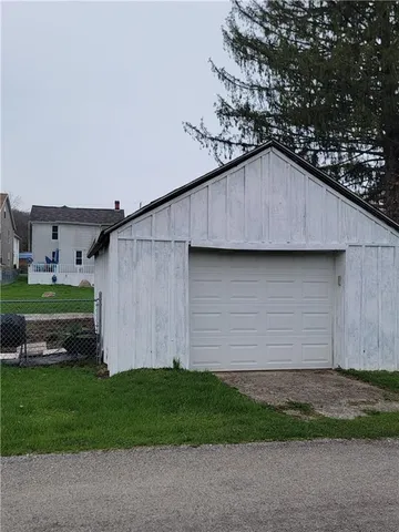 a house view with a backyard space