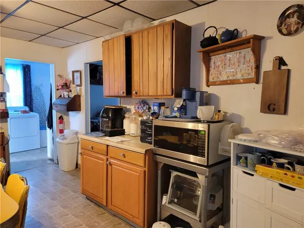 a kitchen with a stove and a sink