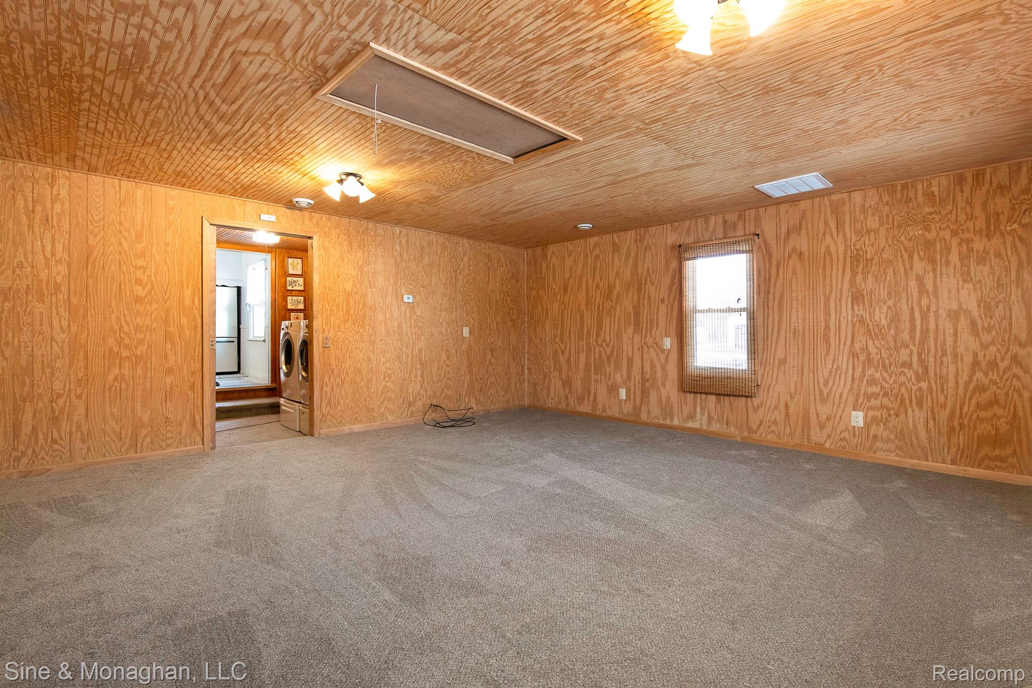 6135 North Genesee Road Flint, MI 48506 - Photo 21 of 45 Use as family room or convert back to garate