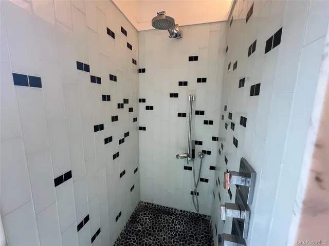 a bathroom with a shower curtain