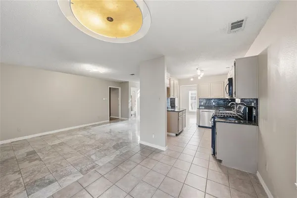 a view of a kitchen with a sink