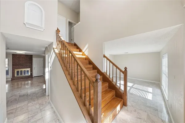 a view of staircase with white walls and white walls