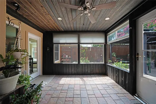 a view of a backyard with sitting area and furniture