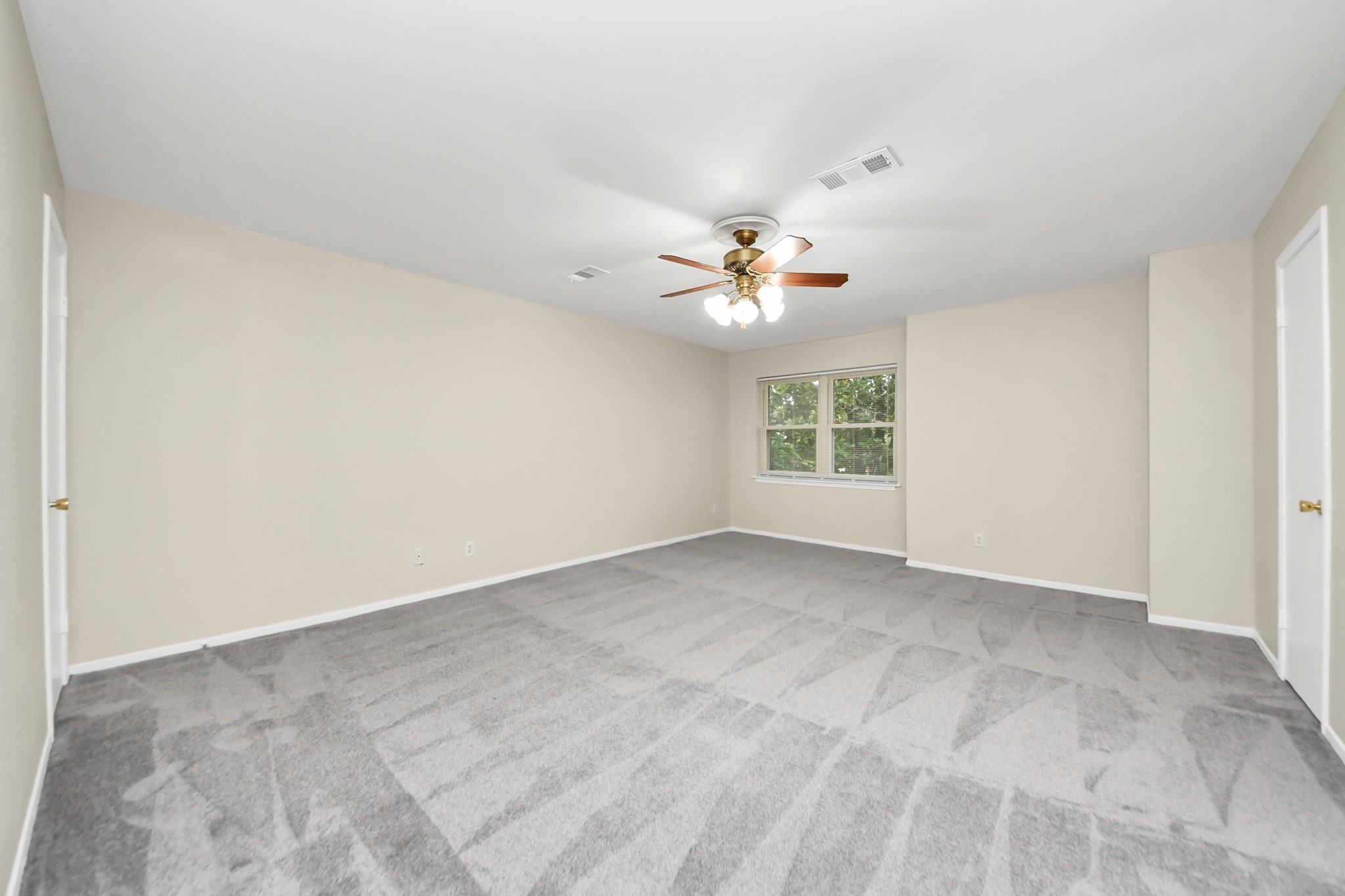8234 Fondren Road, Unit 8234 Houston, TX 77074 - Photo 5 of 10 a view of an empty room with windows