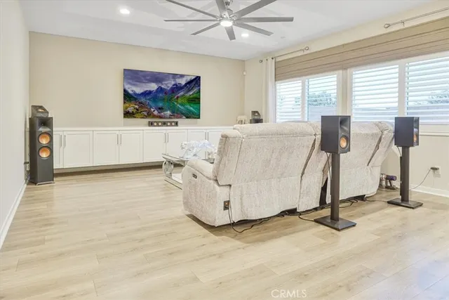 a living room with a couch and a flat screen tv