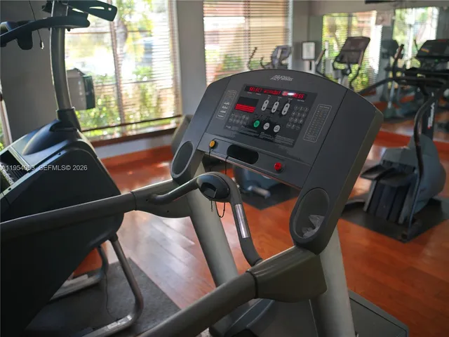 a childrens park with lots of swings and slides