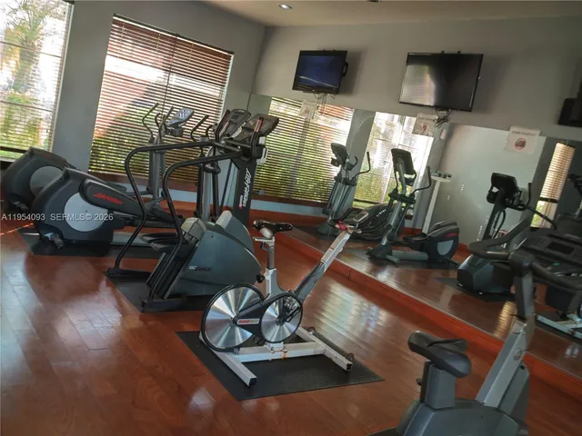 a view of a lake with a houses in the back