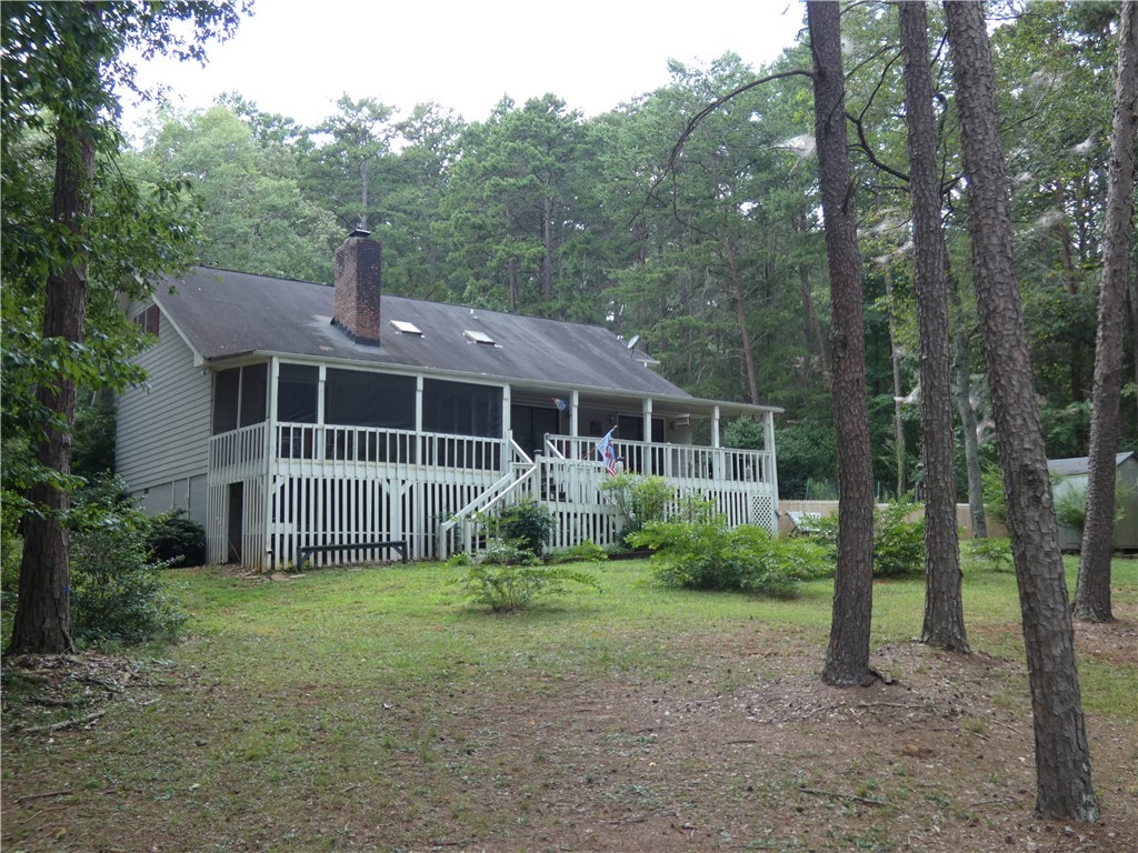 587 Currahee Ridge Road Toccoa, GA 30577 - Photo 14 of 19 Back of Home with covered deck and screened porch