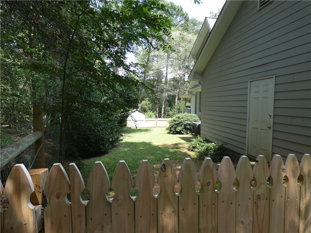 587 Currahee Ridge Road Toccoa, GA 30577 - Photo 15 of 19 Fenced side yard - great for family pet.