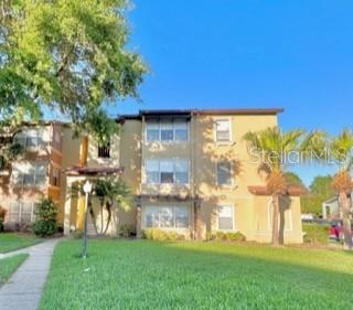 5124 Conroy Road, Unit 17 Orlando, FL 32811 - Photo 1 of 1 Building Front