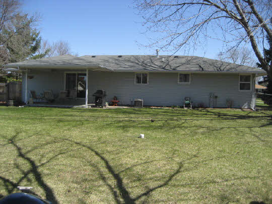 4075 Valerie Road Roscoe, IL 61073 - Photo 6 of 11 a view of a house with a yard