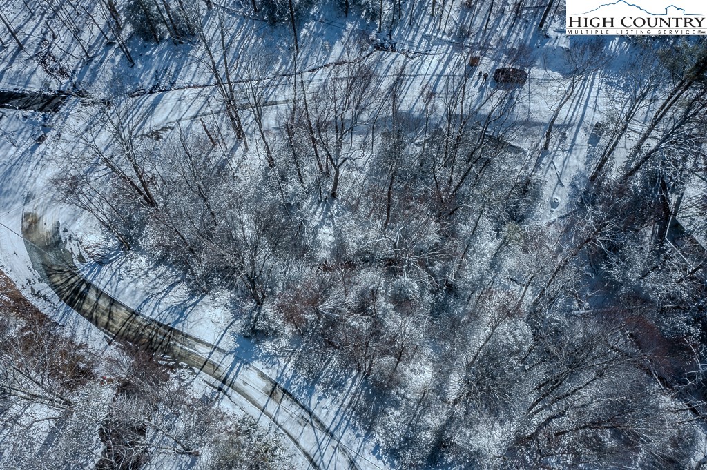 252 Greenbriar Road Beech Mountain, NC 28604 - Photo 13 of 17 a view of a yard