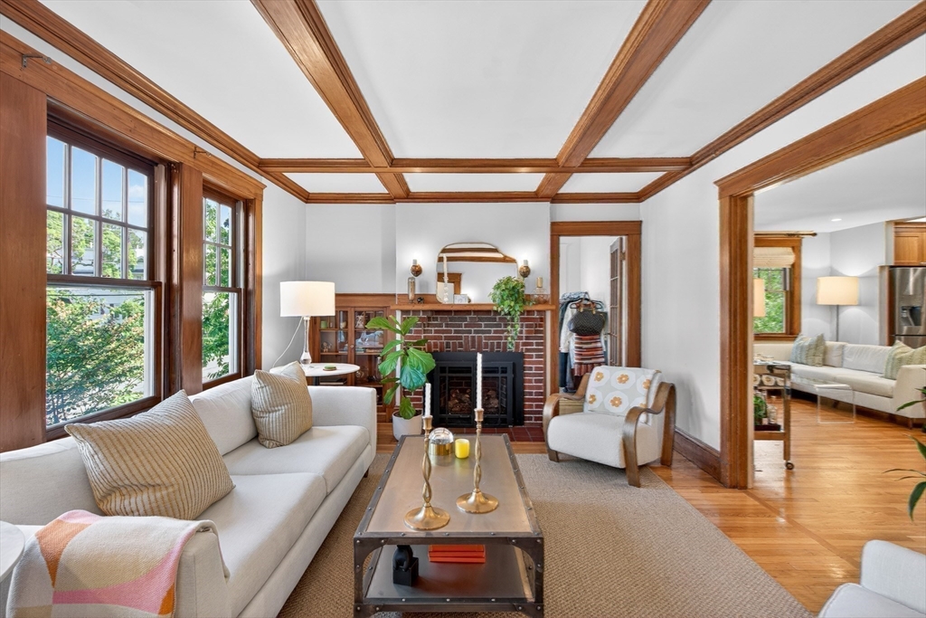 76-78 Lewis Road Belmont, MA 02478 - Photo 6 of 36 a living room with furniture fireplace and a large window