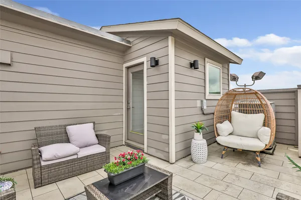 a front view of a house with patio