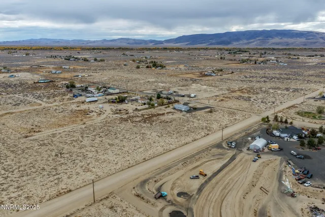 a view of a dry yard with wooden floor
