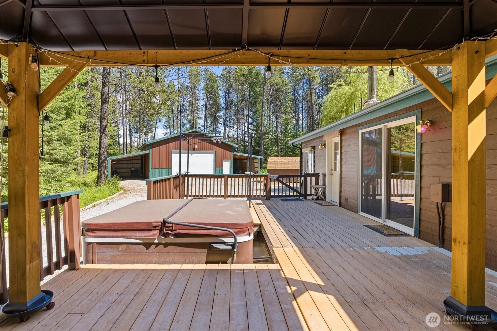 1142 Driskill Road Newport, WA 99156 - Photo 27 of 40 a house view with a seating space and garden view