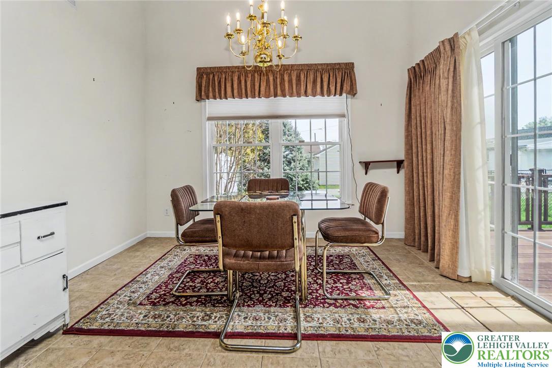 2132 Lexington Avenue Bethlehem, PA 18017 - Photo 19 of 47 a view of a dining room with furniture window and wooden floor