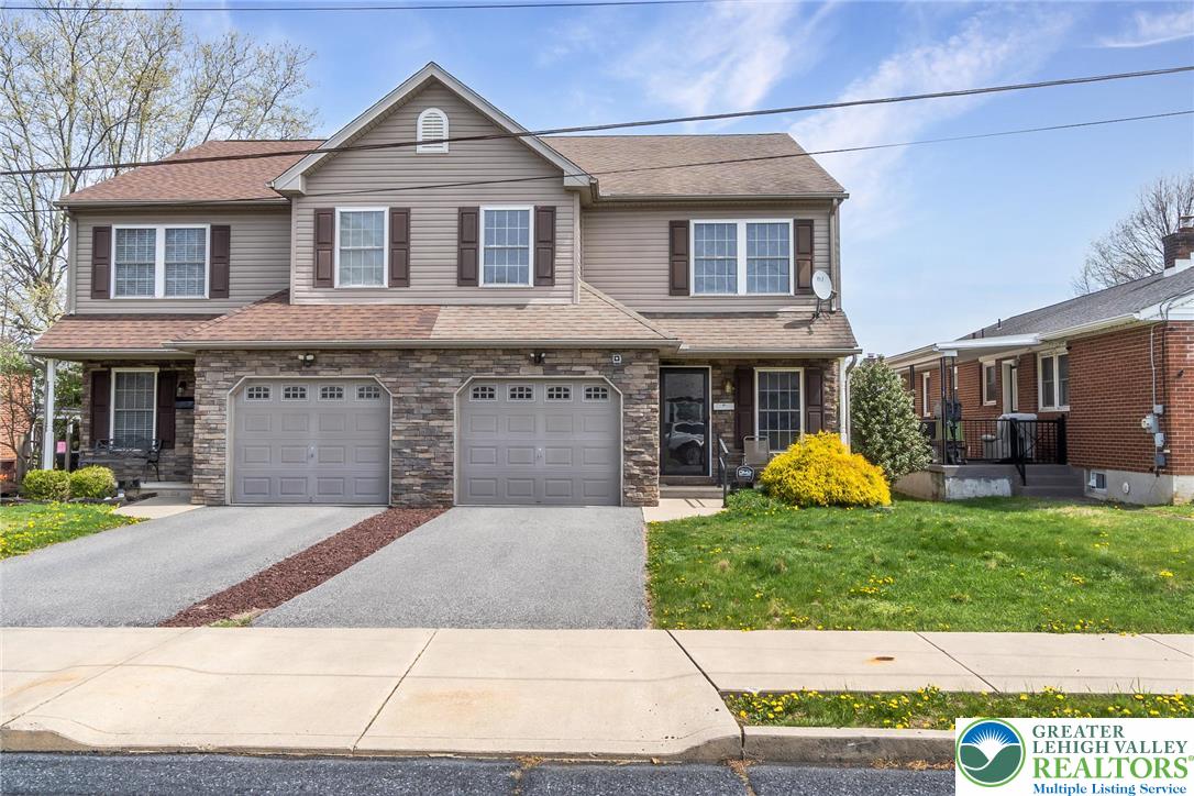 2132 Lexington Avenue Bethlehem, PA 18017 - Photo 2 of 47 a front view of a house with garden