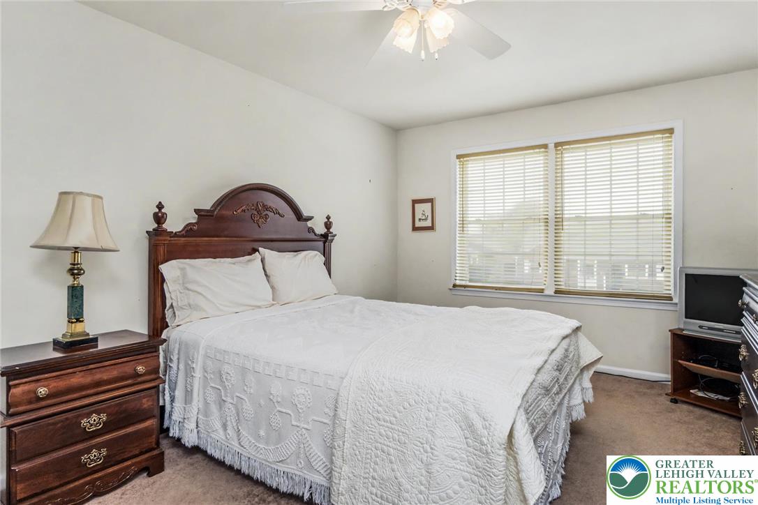 2132 Lexington Avenue Bethlehem, PA 18017 - Photo 24 of 47 a bedroom with a bed and a tv on the dresser