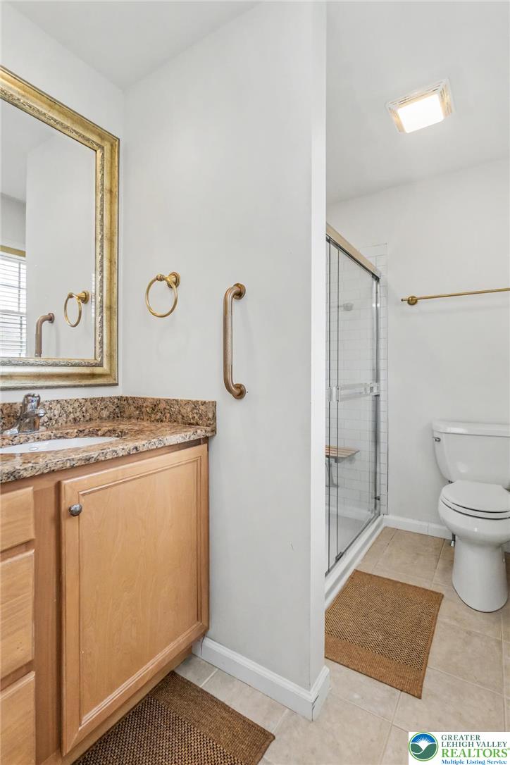 2132 Lexington Avenue Bethlehem, PA 18017 - Photo 26 of 47 a view of a bathroom with a sink and a toilet