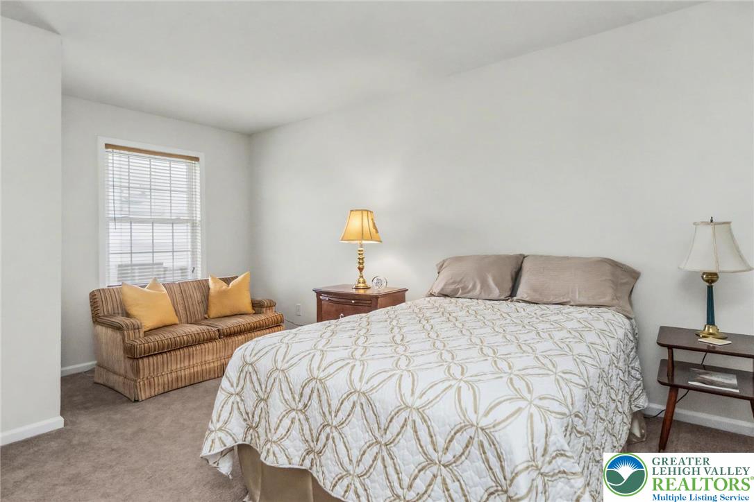 2132 Lexington Avenue Bethlehem, PA 18017 - Photo 30 of 47 a bedroom with a bed and a couch