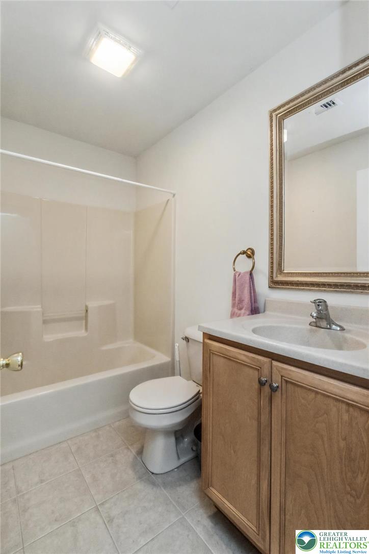 2132 Lexington Avenue Bethlehem, PA 18017 - Photo 35 of 47 a bathroom with a sink toilet and shower