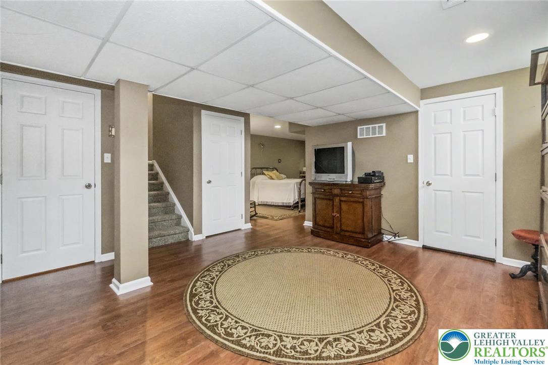 2132 Lexington Avenue Bethlehem, PA 18017 - Photo 38 of 47 a room with furniture and a wooden floor