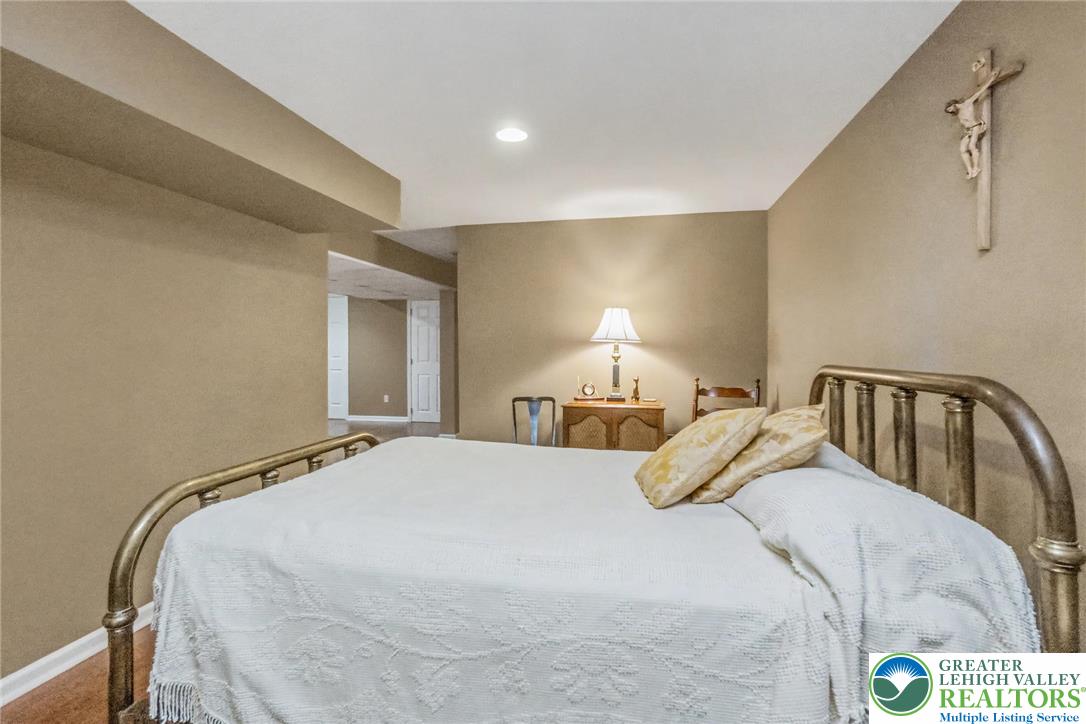 2132 Lexington Avenue Bethlehem, PA 18017 - Photo 40 of 47 a bedroom with a bed and lamp