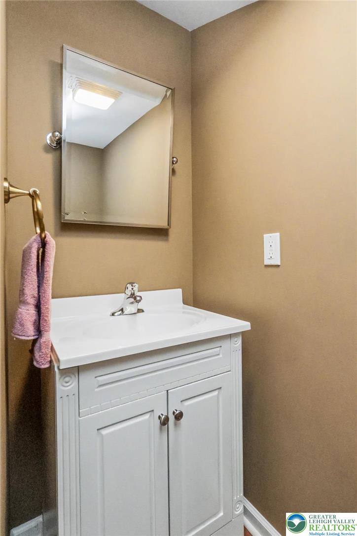 2132 Lexington Avenue Bethlehem, PA 18017 - Photo 42 of 47 a bathroom with a sink vanity and a mirror